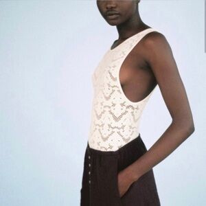 NWT Zara cream seamless mesh/lace pattern bodysuit. Size XS.